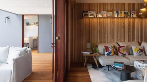 a living room with a couch and a table at Exclusive Villa in a Privileged Place in Gustavia