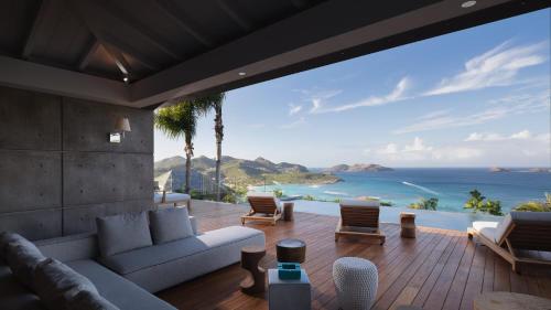 a living room with a view of the ocean at Exclusive Villa in a Privileged Place in Gustavia