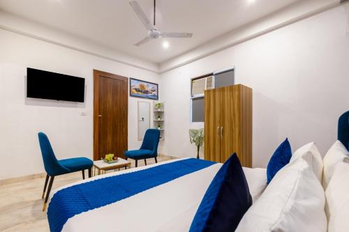 TV a/nebo společenská místnost v ubytování Hotel Noida Business Suites