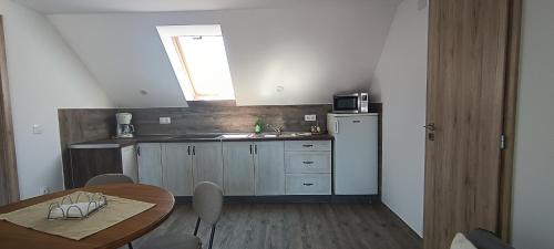 Kuchyň nebo kuchyňský kout v ubytování Marianna Apartman
