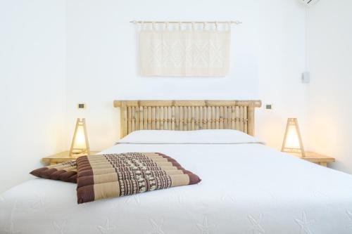 Postel nebo postele na pokoji v ubytování B&B Artemisia