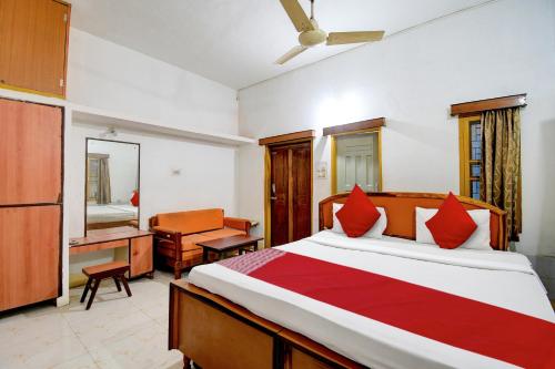 Postel nebo postele na pokoji v ubytování HOTEL O Upasana