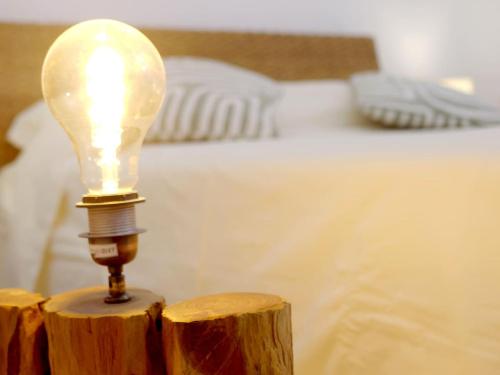 En eller flere senge i et værelse på Al Cortiletto Bed&Bike