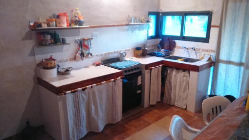 
A kitchen or kitchenette at CABAÑAS LDM
