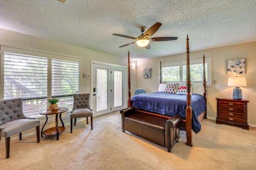 a bedroom with a bed and a ceiling fan at Relaxing Helotes Apt 7 Mi to UT at San Antonio! in San Antonio