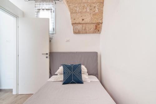 Katil atau katil-katil dalam bilik di Salento Rosa dei Venti Rooms & Pool - Lecce Selection