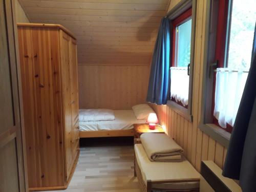 Un ou plusieurs lits dans un hébergement de l'établissement Ferienhaus In Granzow Mit Terrasse