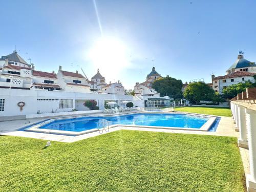 a swimming pool in the yard of a house at Vilamoura Central 12 With Pool by Homing in Vilamoura