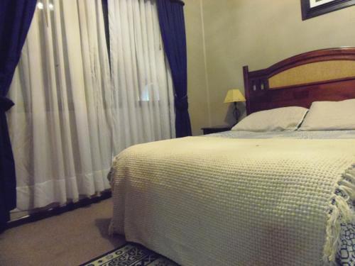 Hotel Empresarialにあるベッド