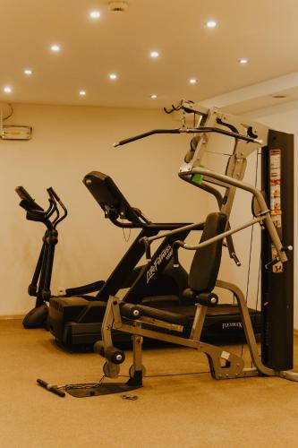a gym with two exercise bikes in a room at Hotel Cieplice MEDI & SPA in Jelenia Góra