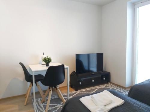 Foto Kotimaailma Apartments - keskustayksiö - Aleksanterinkatu 3