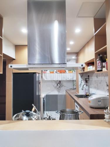 a kitchen with a sink and a counter top at Whale House in Chongqing