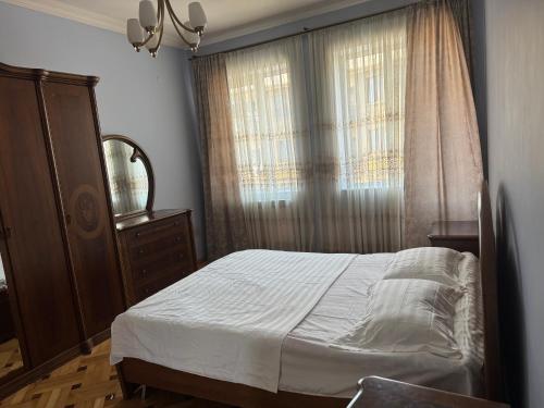 Postel nebo postele na pokoji v ubytování Apartment Gorgiladze