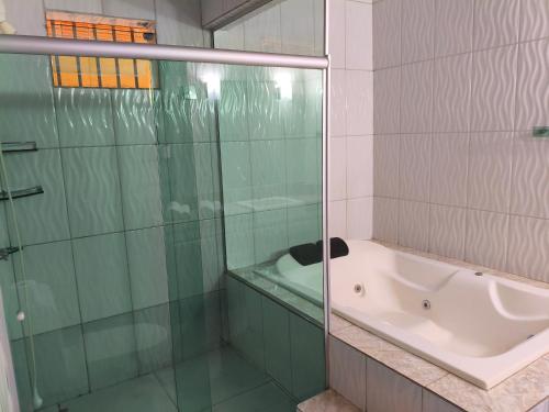 Koupelna v ubytování Casa aconchegante com hidro