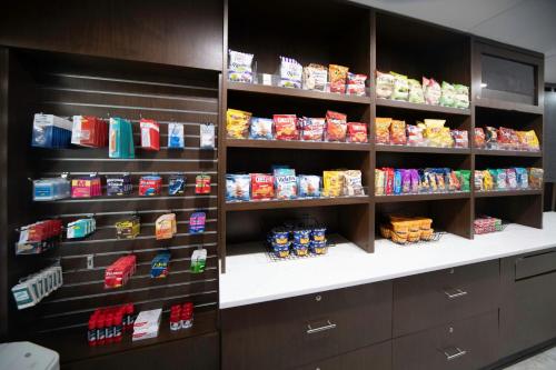 a store filled with lots of different types of food at Four Points by Sheraton Fayetteville Fort Bragg in Fayetteville