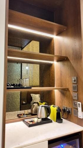 Kuchyň nebo kuchyňský kout v ubytování فرساي VERSAiLLES