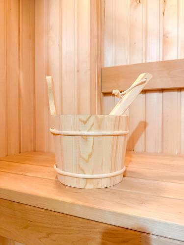 a bucket sitting on top of a wooden table at Školní 60 in Pelhřimov