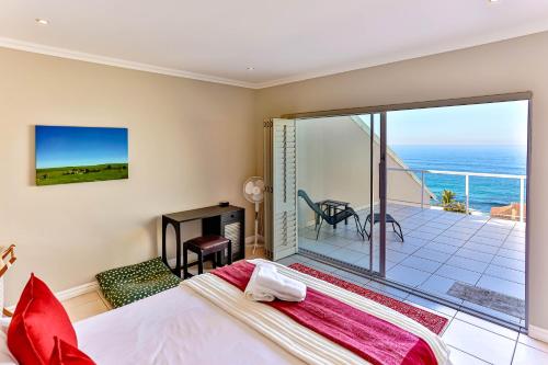 En eller flere senge i et værelse på Oyster Breeze 306