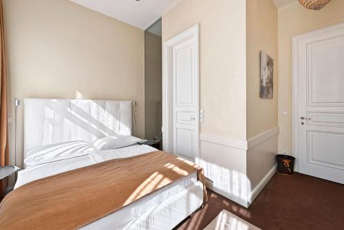 a bedroom with a large bed in a room at 6 rooms in Vienna