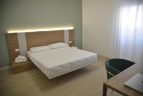 HT Room Spa & Suiteにあるベッド
