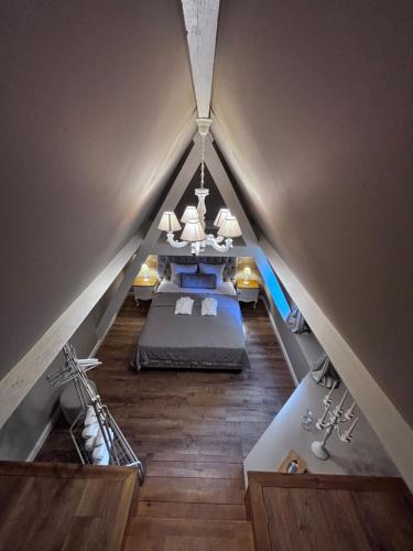 Le Manoir des Etangsにあるベッド