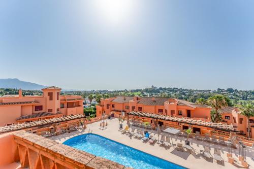 an aerial view of a resort with a swimming pool at Royal Marbella Golf Resort in Estepona