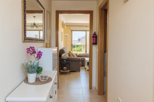 Χώρος καθιστικού στο Apartamento con piscina de verano e invierno