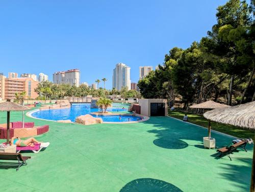 Πισίνα στο ή κοντά στο Apartamento con piscina de verano e invierno
