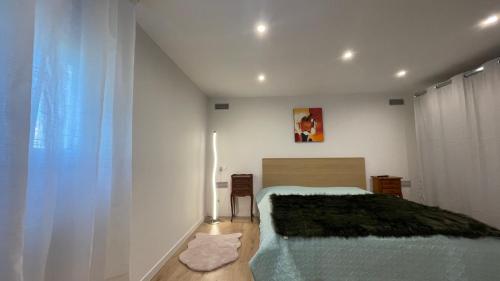 Katil atau katil-katil dalam bilik di Le Havre d'Athena, App spacieux 2 chambres, Grand Jardin Privé, Sauna, WiFi & Abri Vélos