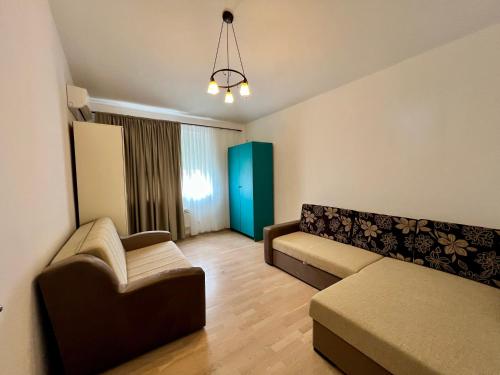 a living room with two couches and a couch at Kumbor summer holiday in Topla