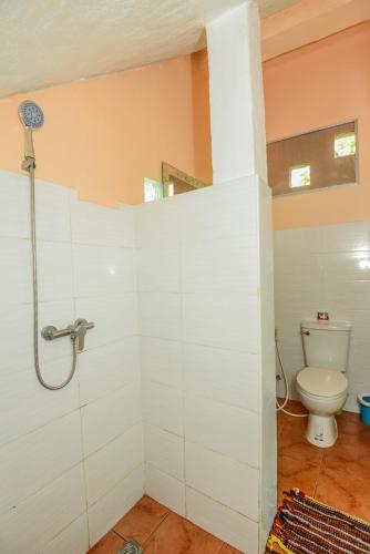 a bathroom with a shower and a toilet at Sairee View Resort in Koh Tao