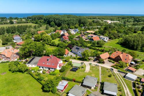 an aerial view of a suburb with houses and trees at Tarnewitz Pierre Wohnung Pierre 01 in Tarnewitz