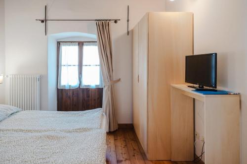 Кровать или кровати в номере Casa Vanni Dimora storica