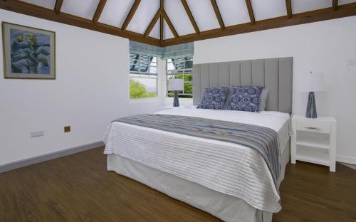 Llit o llits en una habitació de John John Cottage cottage