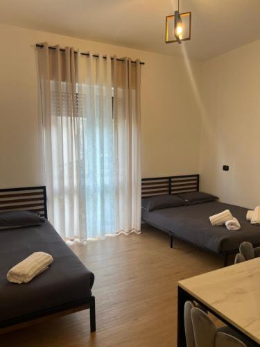 Ένα ή περισσότερα κρεβάτια σε δωμάτιο στο Affittacamere Linda