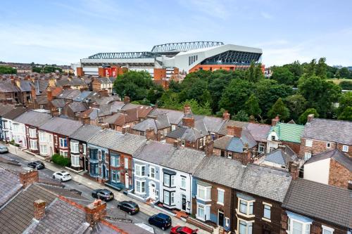 an aerial view of a town with houses and a stadium at Watford Lodge - Air Host & Stay - A Home in the Heart of Anfield in Liverpool