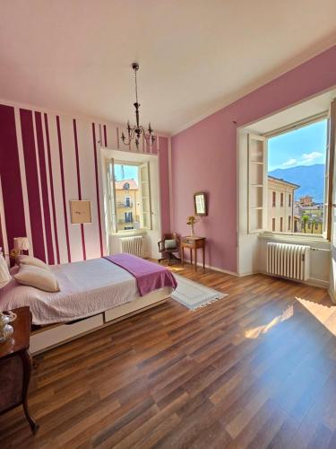 Voodi või voodid majutusasutuse Borghese Rooms - Città Vecchia Locarno toas