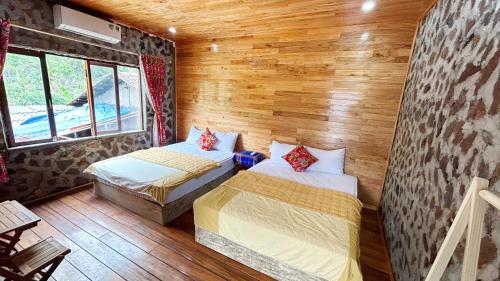 Postel nebo postele na pokoji v ubytování Homestay A Sy - Near Ban Gioc waterfall