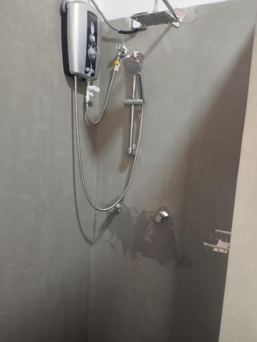 Ένα μπάνιο στο Pura Handa Home Stay