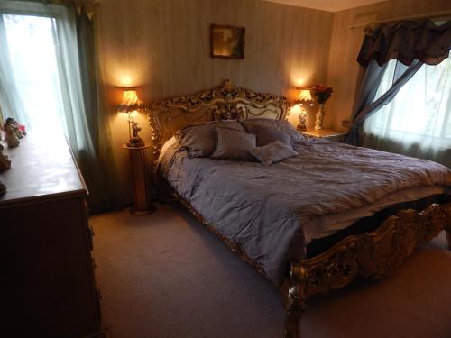 Cama o camas de una habitación en Fern Forest Getaway