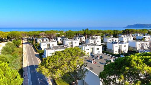 an aerial view of a city with the ocean at White Moon Apartment 301 in Lalzit Bay