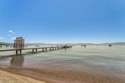 a beach with a pier in the water at Less Than 2 Blocks to Lake Tahoe Family Home Near Skiing in Homewood