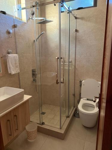 Vannituba majutusasutuses Pearl Gate Residence Apt No 3