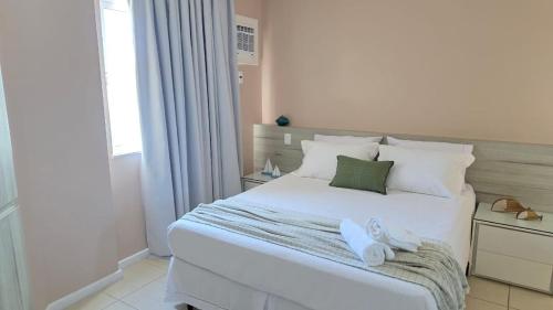 Postel nebo postele na pokoji v ubytování Lindo apartamento frente mar na Prainha com Ar Condicionado, Piscina