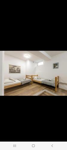 Postel nebo postele na pokoji v ubytování Hvar Central