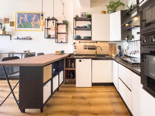 Kuchyň nebo kuchyňský kout v ubytování The cozy apartment - Turro M1