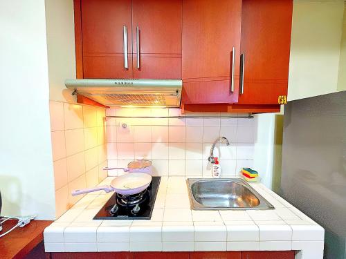 Η κουζίνα ή μικρή κουζίνα στο Apt patria park 2br cozy by LuckyStay