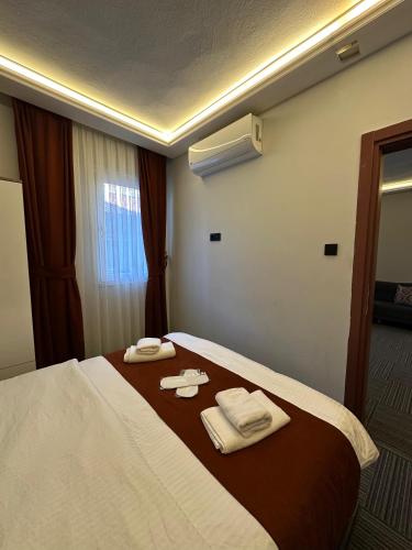 Ένα ή περισσότερα κρεβάτια σε δωμάτιο στο Vira Suite Otel