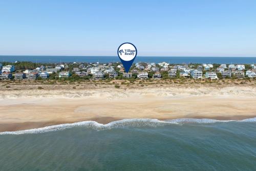 a hot air balloon flying over the beach at Afterdune Delight in Salvo