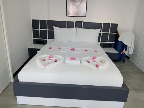 Ένα ή περισσότερα κρεβάτια σε δωμάτιο στο WB Weekend Otel
